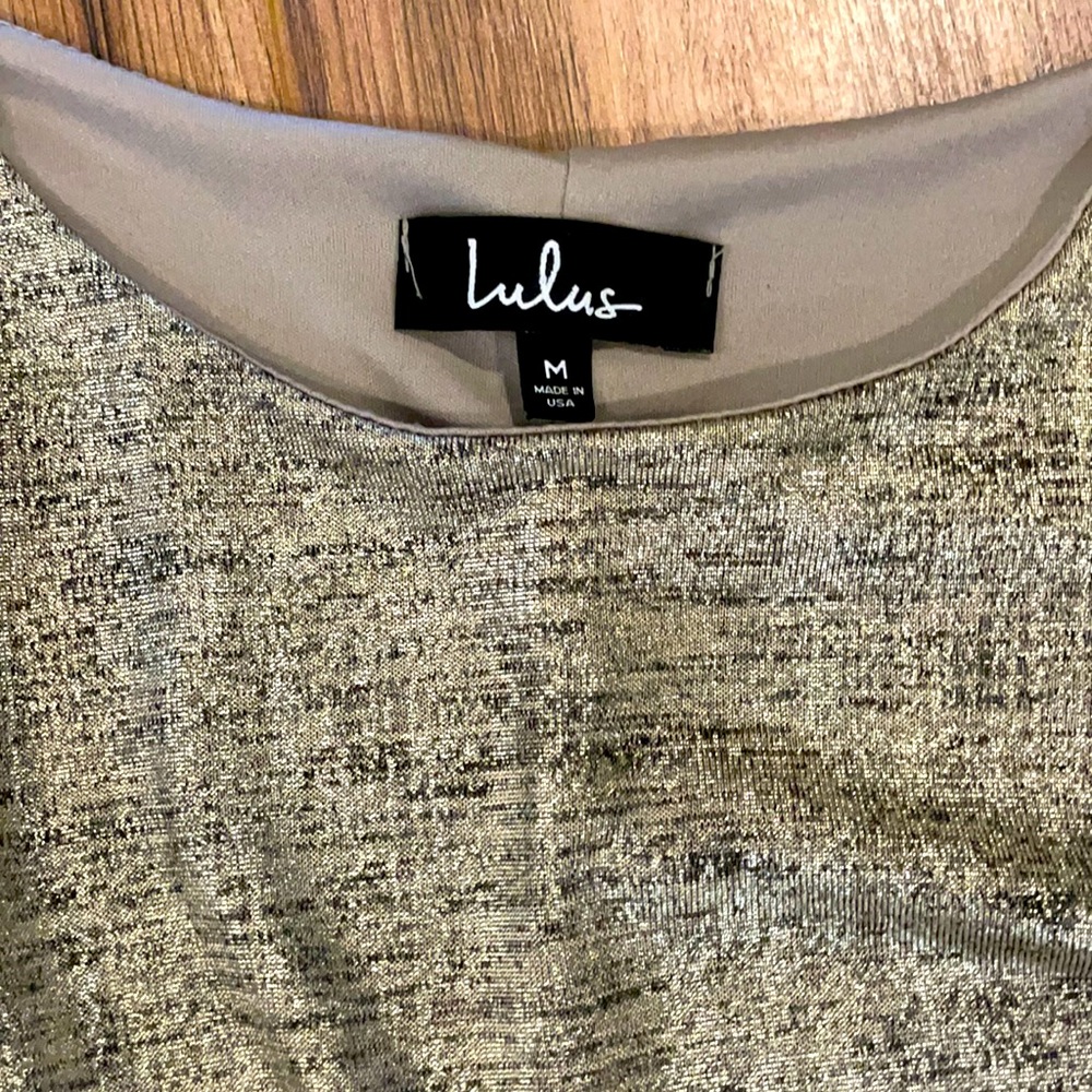 Lulu’s brand gold dress . Stretchy , warn once .